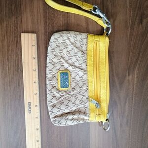 Anne Klein Yellow and Cream Wristlet with Textured Design